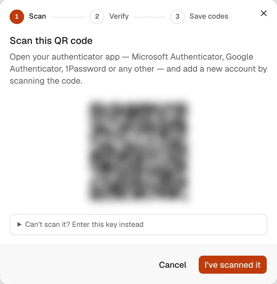 The two-factor setup dialog on the Scan step, with the Scan, Verify and Save codes stepper, a blurred QR code, the “Can’t scan it? Enter this key instead” option and the I’ve scanned it button